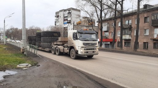 Перевозка негабаритных шин и колес карьерной техники стоимость услуг и где заказать - Красноярск